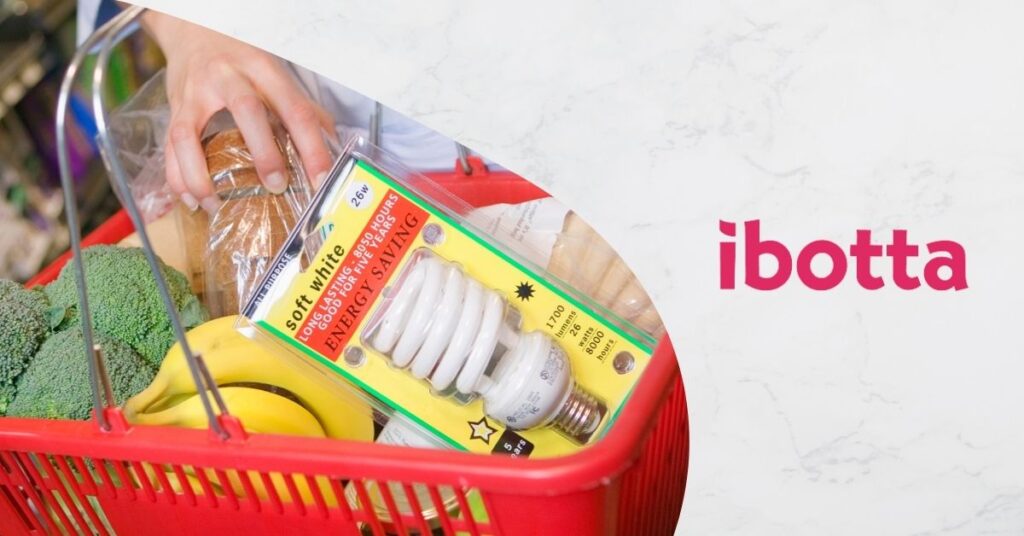 Ibotta Featured Image. Person Grocery shopping. Food and lightbulb in store basket with marble background