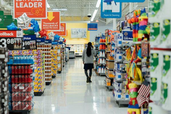 Person walking through store.