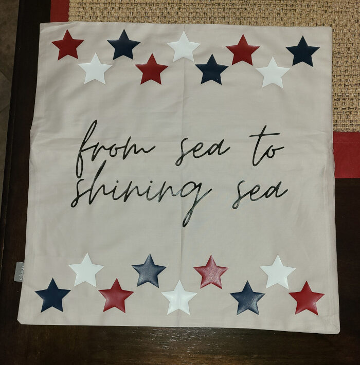 4 Pack Cotton Throw Pillow Cover- 16x16 off white customized with stars and the saying 'from sea to shining sea' using red white and blue HTV