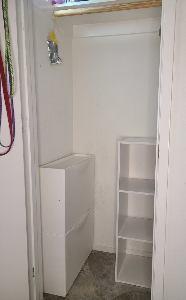 Entryway closet with new cubby, shoe cabinets and hangers